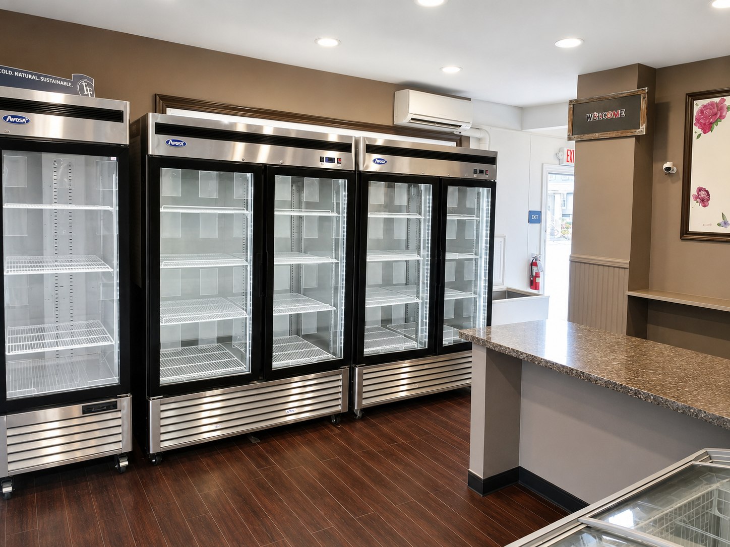 Front service area with glass-door display refrigerators and counter